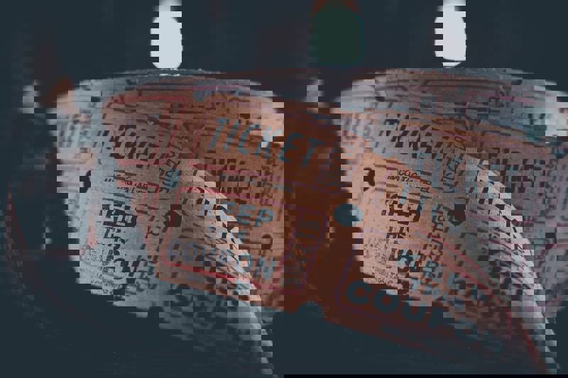 A collection of old-fashioned tickets.