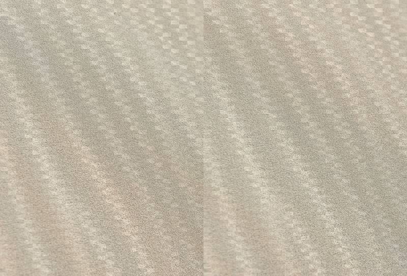 Close-up of smooth, wavy sand texture under natural light.